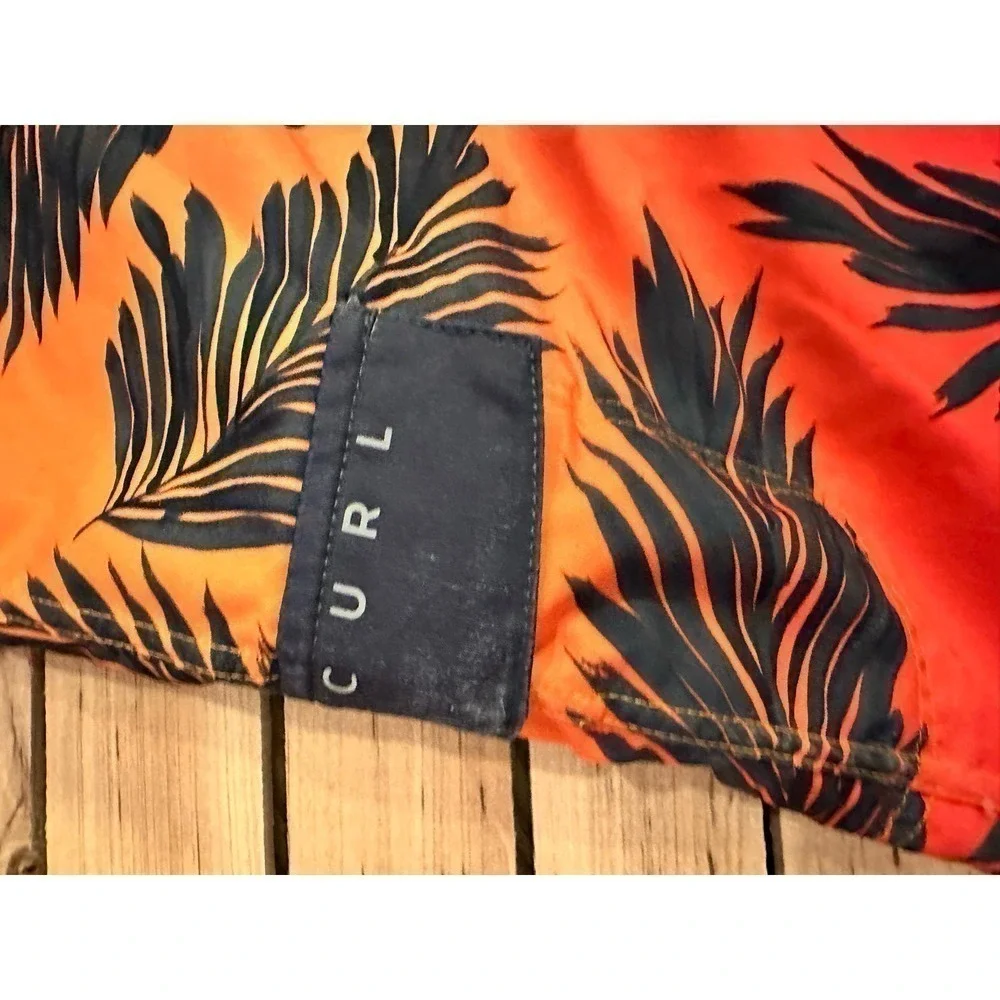 Rip Curl board shorts, boys size 26, tropical